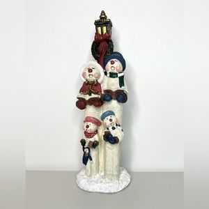 Caroling holiday family. Ceramic figurine.
